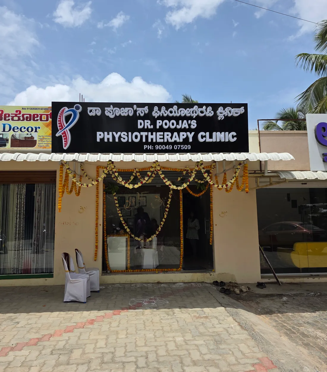 Chikkanayakanahalli branch entrance showing Dr Pooja’s Physiotherapy Clinic signage